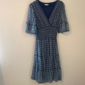 Beautiful “peacock” print. Worn once. Midi dress. Very flattering.